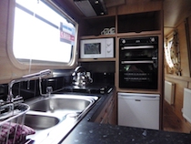 The Savoy Hill V canal boat operating out of Anderton