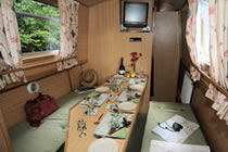 The Black Woodpecker canal boat operating out of Wrenbury